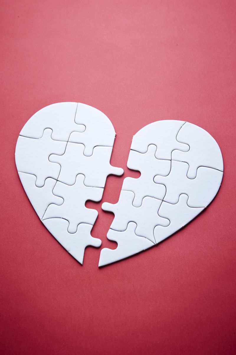 A heart consisting of many puzzle pieces. The image displays that finding the right partner means finding the right match for many pieces of your character.